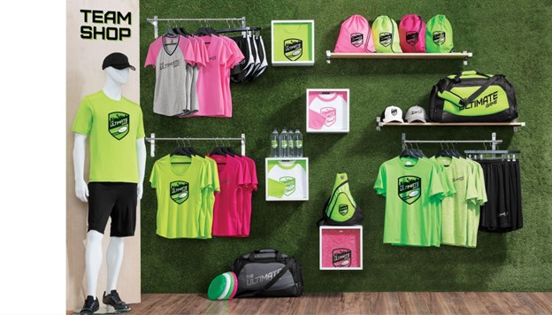 Bright branded t-shirts and sportswear on a wall display