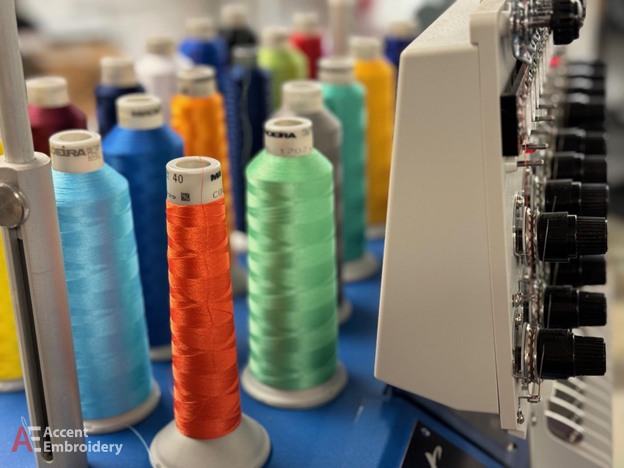 Embroidery machine stitching durable business apparel designs in Amarillo